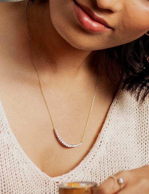 Graduated Atmos Diamond Pendant yellow gold hover