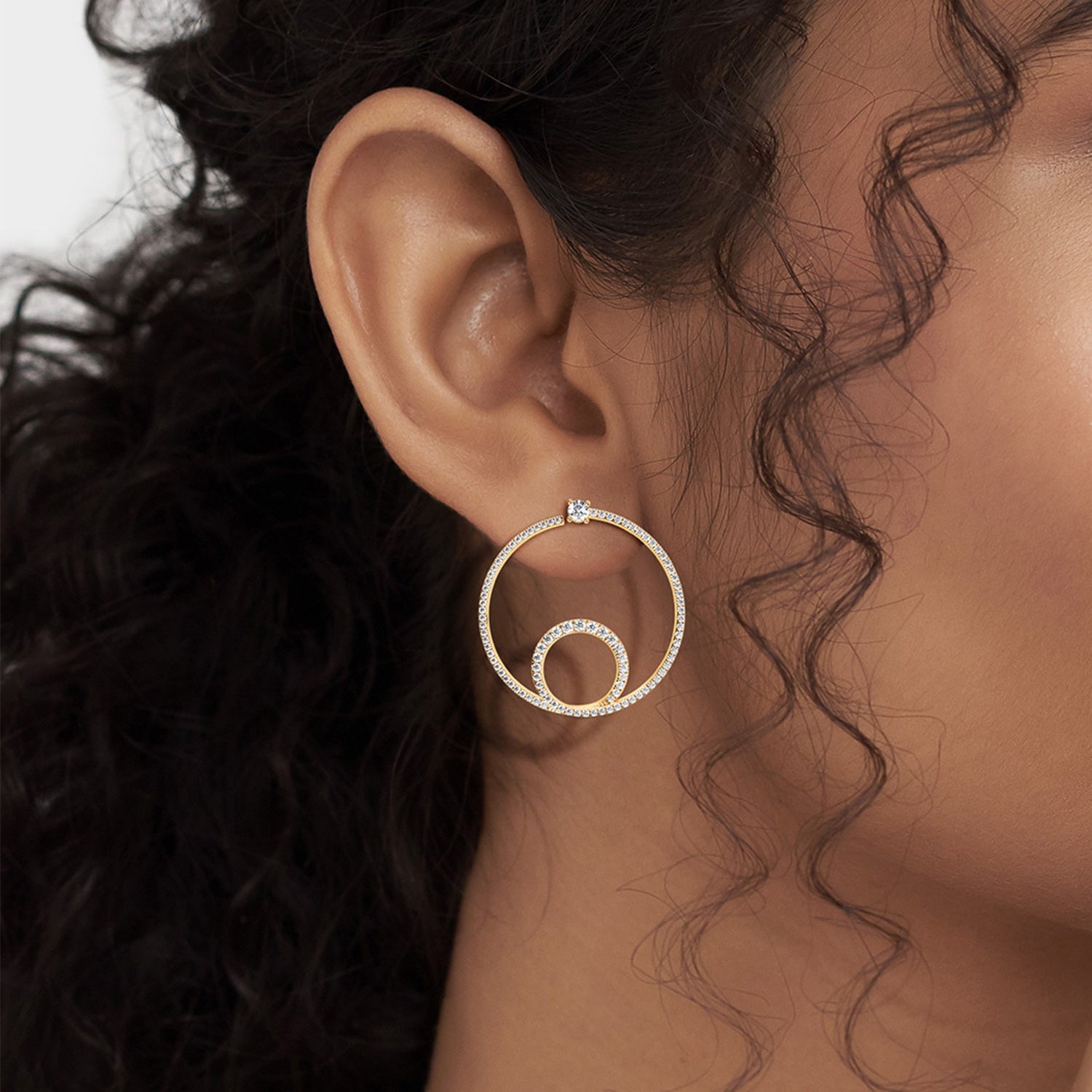 Shimmering Loop Bardot Hoops_Product Angle_Lifestyle Image