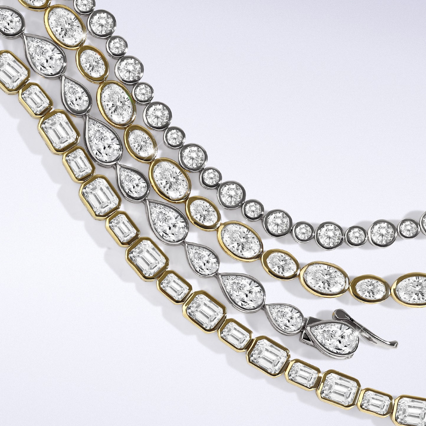 Asymmetrical Bezel-set Oval Tennis Bracelet