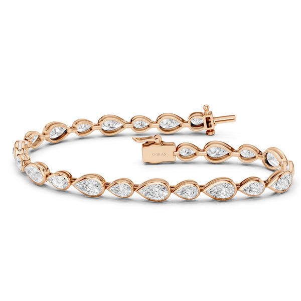 Asymmetrical Bezel-set Pear Tennis Bracelet